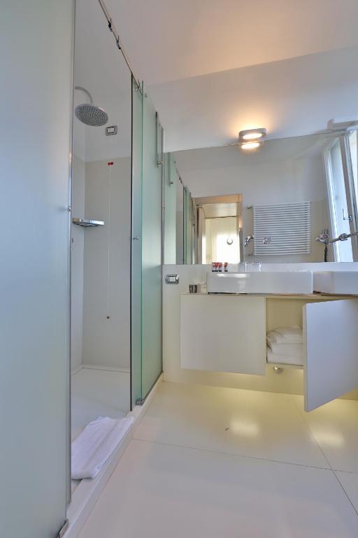 a bathroom with a shower and a sink at Hotel Biasutti in Venice-Lido