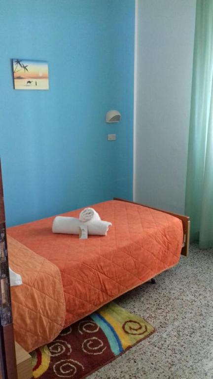 Postel nebo postele na pokoji v ubytování Hotel Acapulco sul mare