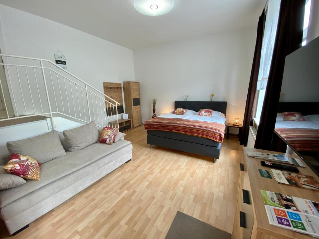 Postel nebo postele na pokoji v ubytování Hotel & Wirtshaus Hödl-Kaplan
