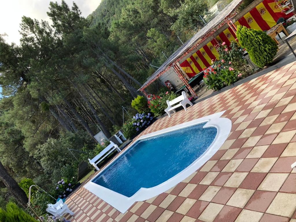 Bazén v ubytování CHALET EN EL CORAZÓN DE LA SIERRA DE GREDOS, PINAR DE LA ATALAYA-TIEMBLO nebo v jeho okolí