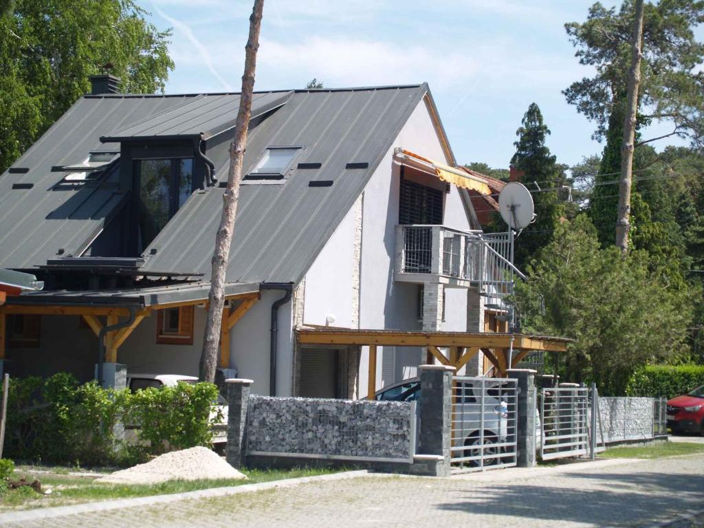 a house under construction with a metal roof at Holiday home in Balatonfenyves 34651 in Balatonfenyves