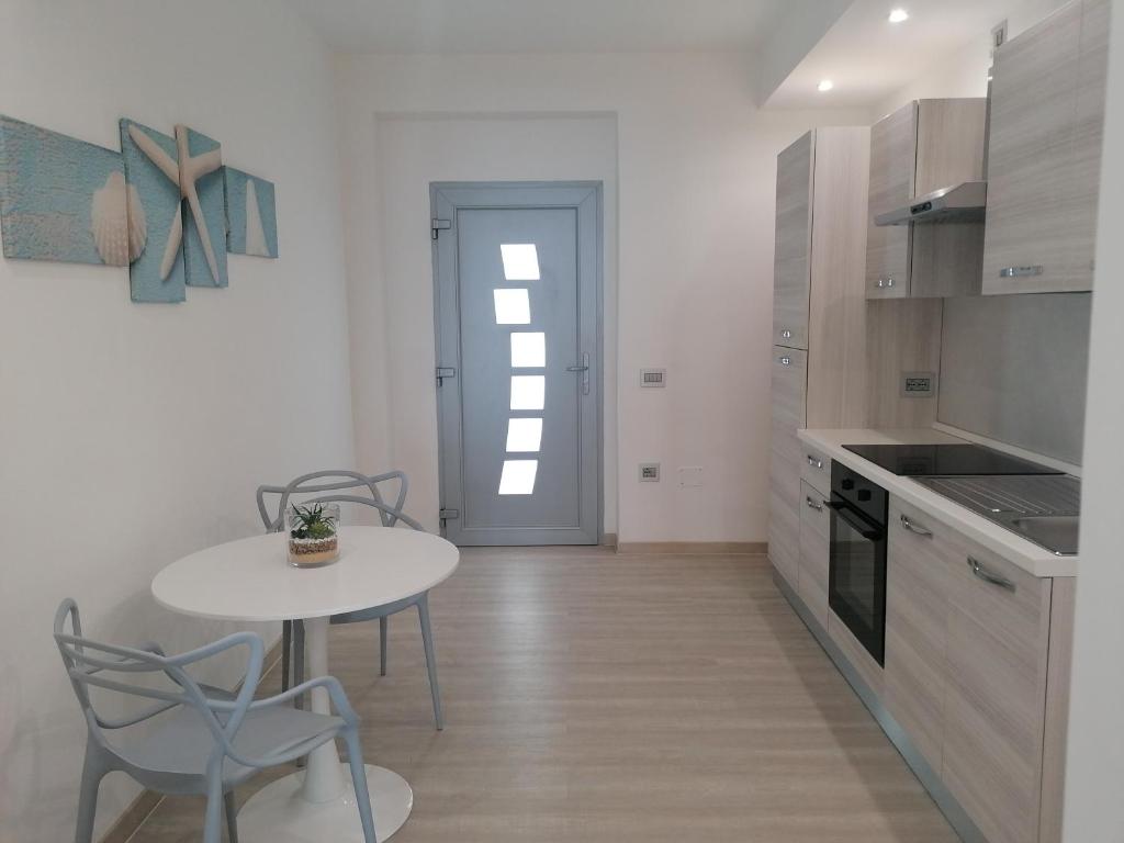 Kuchnia lub aneks kuchenny w obiekcie Borgonuovo Luxury Home
