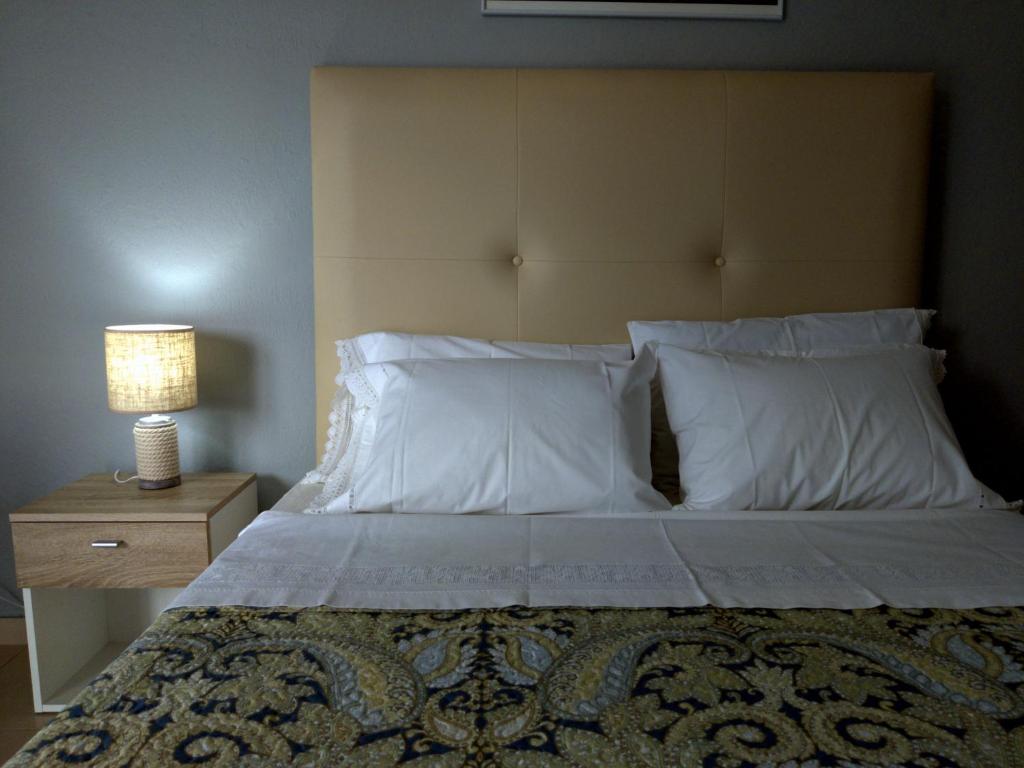 Postel nebo postele na pokoji v ubytování Hospitable appartment in the central park, Xanthi