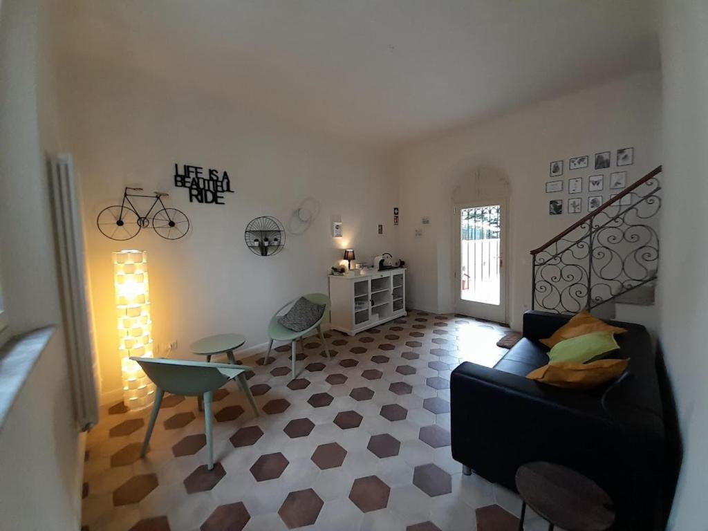 Łóżko lub łóżka w pokoju w obiekcie B&B Villino Luschi Pisa Centro