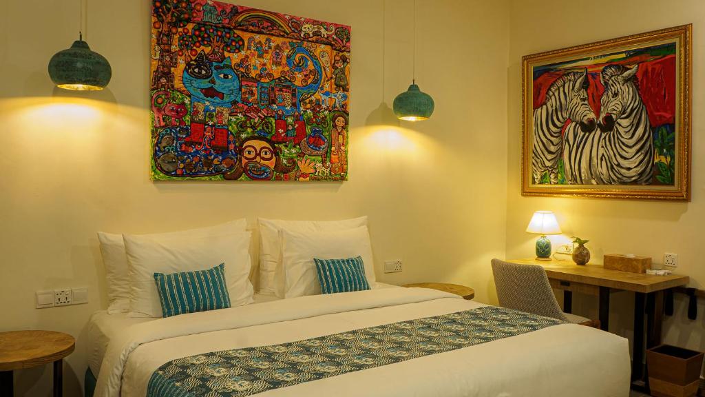 Postel nebo postele na pokoji v ubytování Roka Resort