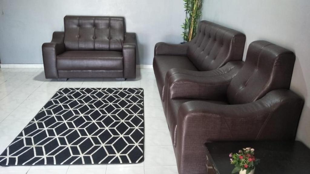 Χώρος καθιστικού στο RUMAH INAP BANDAR PERDANA