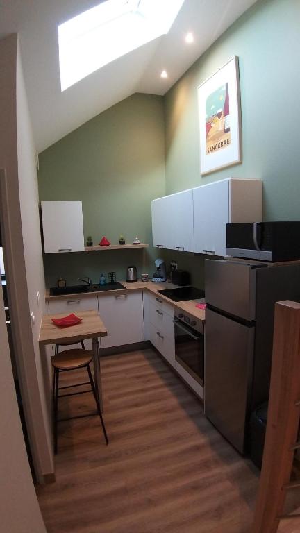 Kuchyňa alebo kuchynka v ubytovaní Maison Coeur de Sancerre