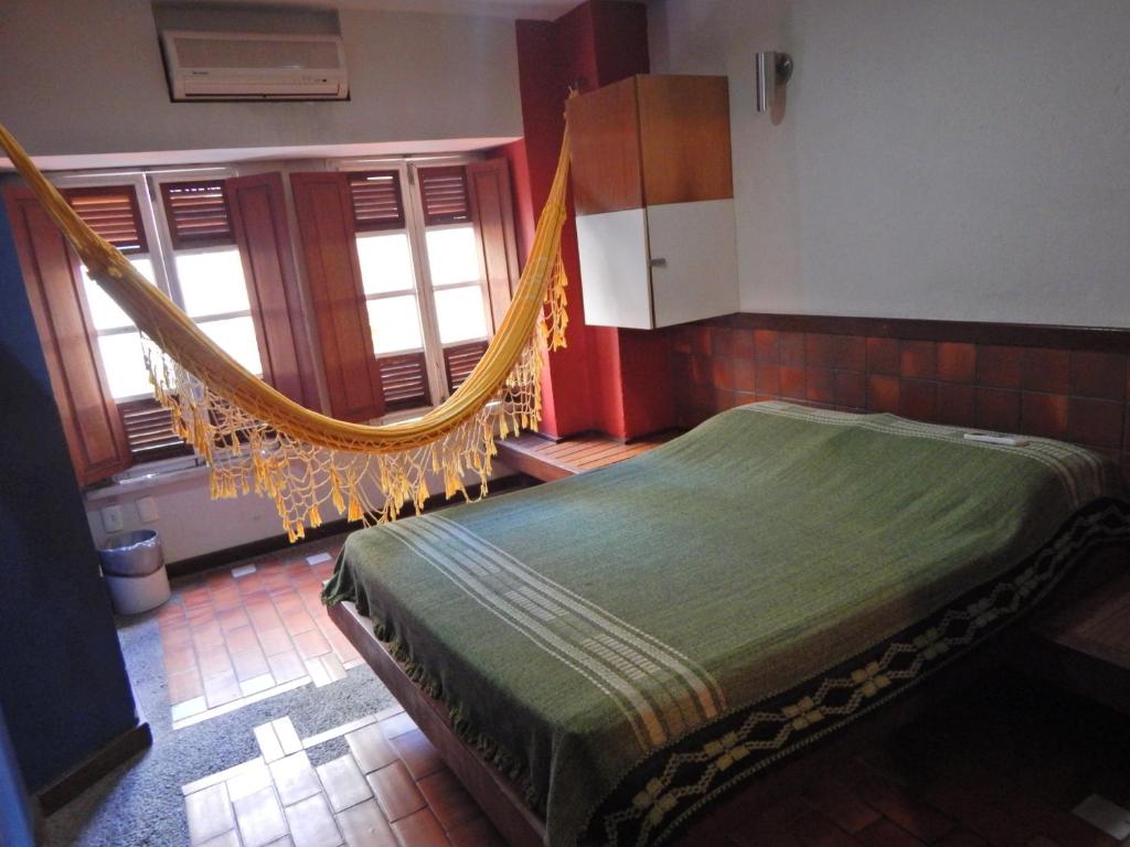 Postel nebo postele na pokoji v ubytování Laranjeiras Hostel