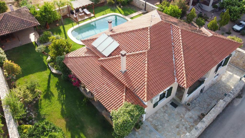 an overhead view of a house with a swimming pool at Kiveri Garden Villa in Kiveri