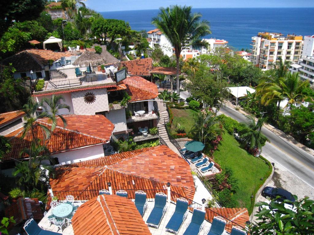 an aerial view of a city with houses and the ocean at Casa Anita in Puerto Vallarta