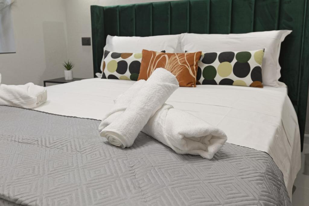 Postel nebo postele na pokoji v ubytování Chianu Palì - Guest Rooms camera Agrigento