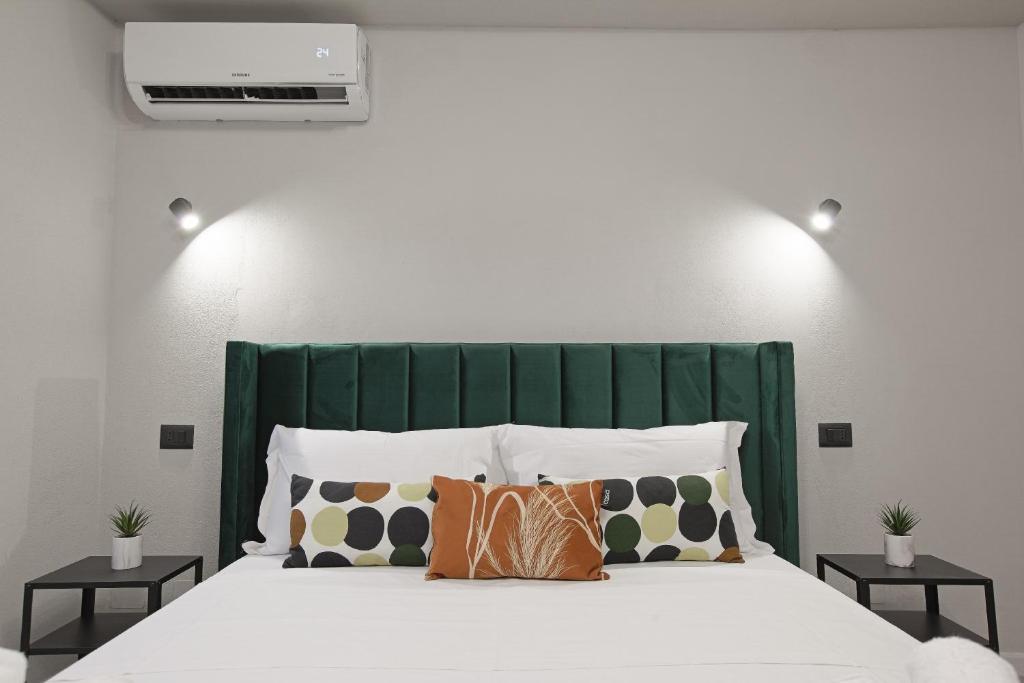 Postel nebo postele na pokoji v ubytování Chianu Palì - Guest Rooms camera Agrigento