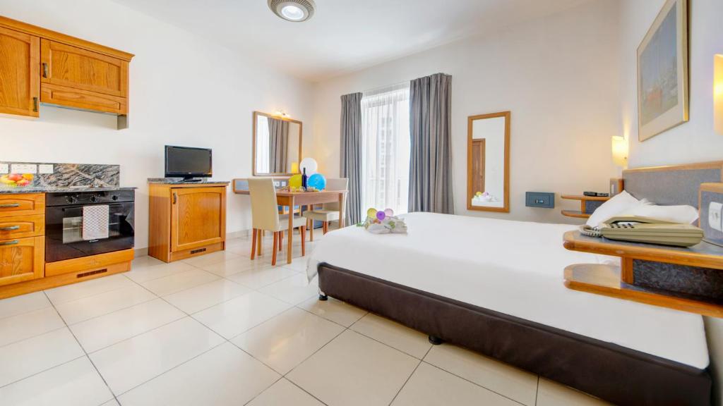 Kuchyň nebo kuchyňský kout v ubytování AX Sunny Coast Resort & Spa