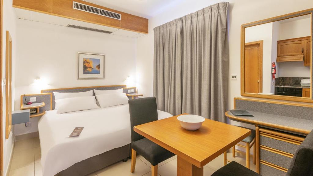 Postel nebo postele na pokoji v ubytování AX Sunny Coast Resort & Spa