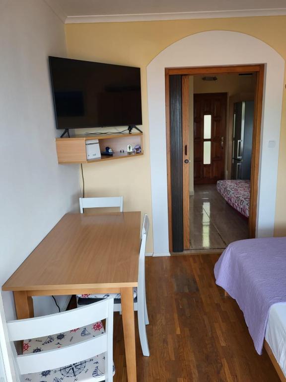 TV a/nebo společenská místnost v ubytování Apartman Ivan