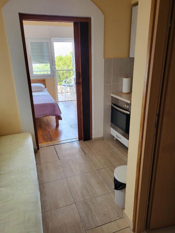 Postel nebo postele na pokoji v ubytování Apartman Ivan