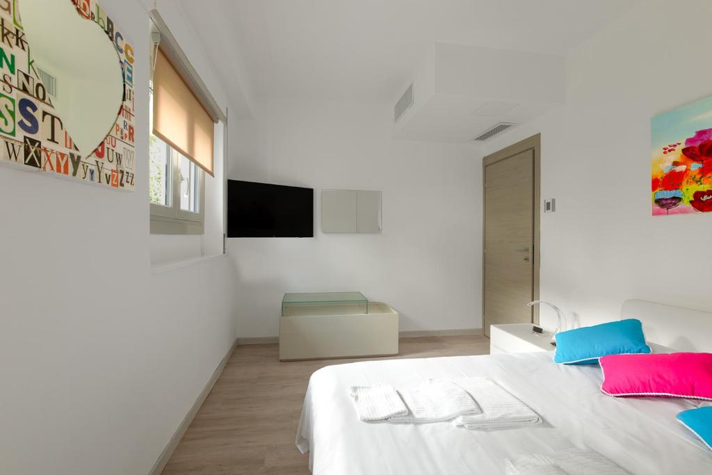 Postel nebo postele na pokoji v ubytování Un sogno sul lago Home Relax