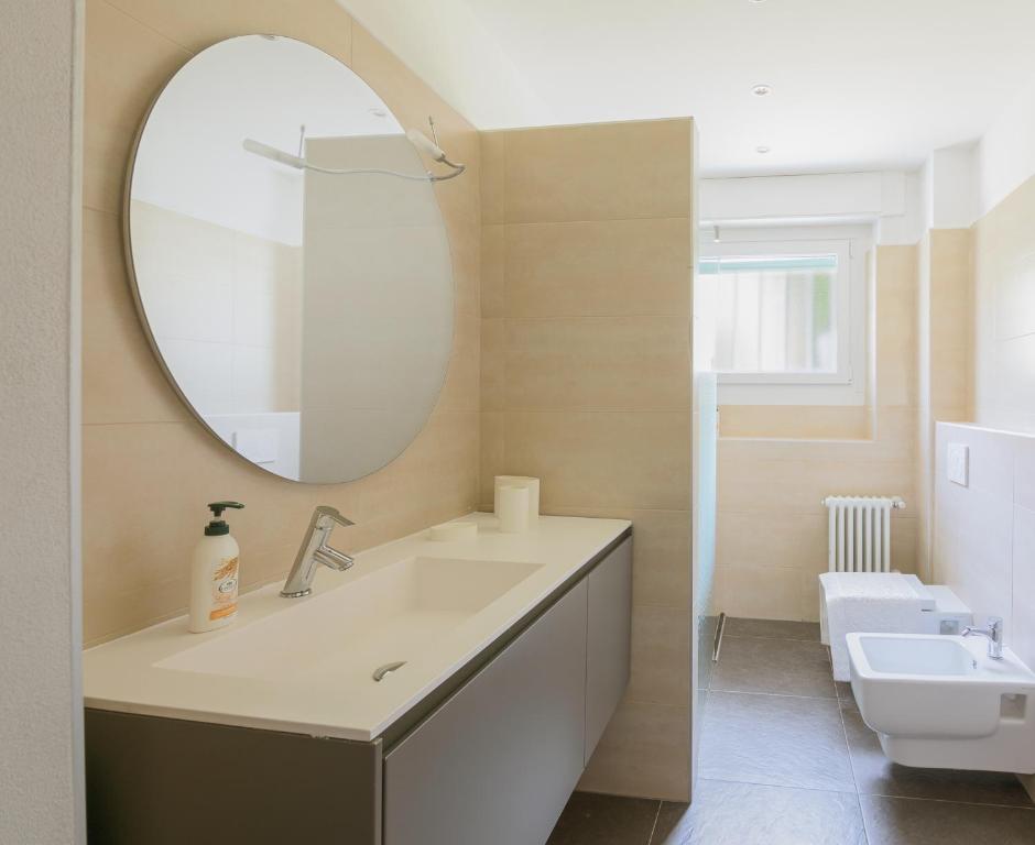 Koupelna v ubytování Un sogno sul lago Home Relax