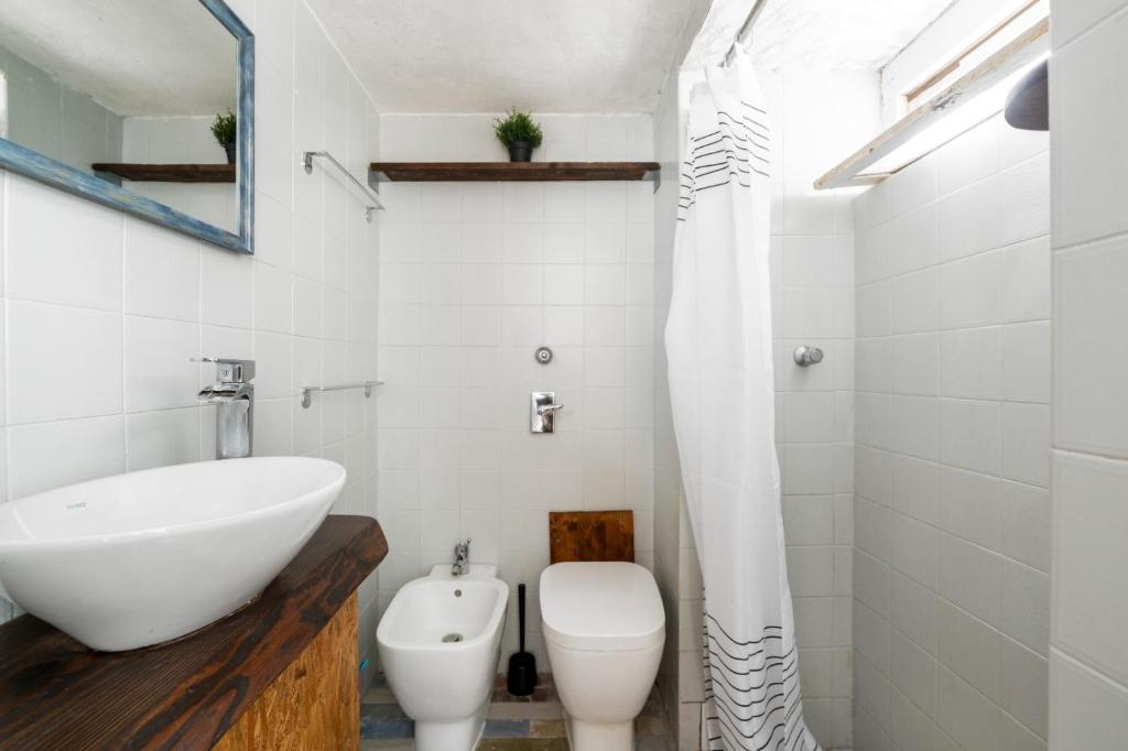 Łazienka w obiekcie Cimiano Cozy Apartment