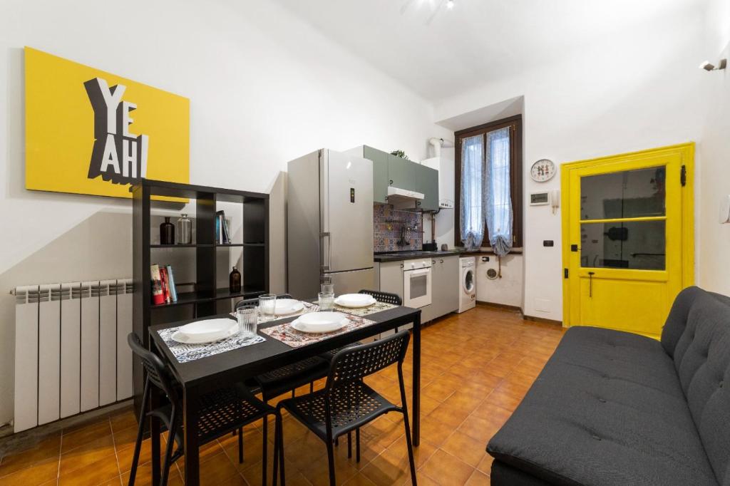 Kuchnia lub aneks kuchenny w obiekcie Cimiano Cozy Apartment
