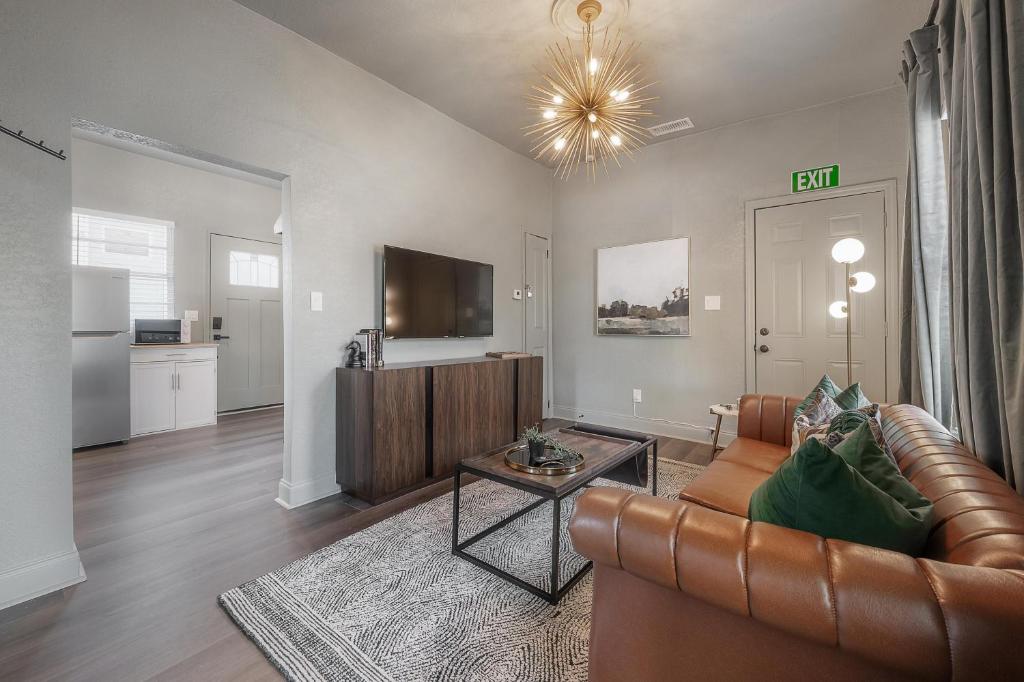 a living room with a couch and a table at Updated Condo in Heart of Tampa in Tampa