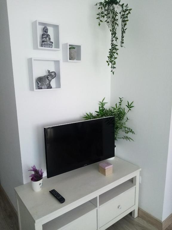 TV a/nebo společenská místnost v ubytování VISTAMAR VISTALUNA