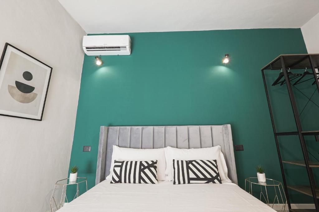 Postel nebo postele na pokoji v ubytování Chianu Palì - Guest Rooms camera Agrigento