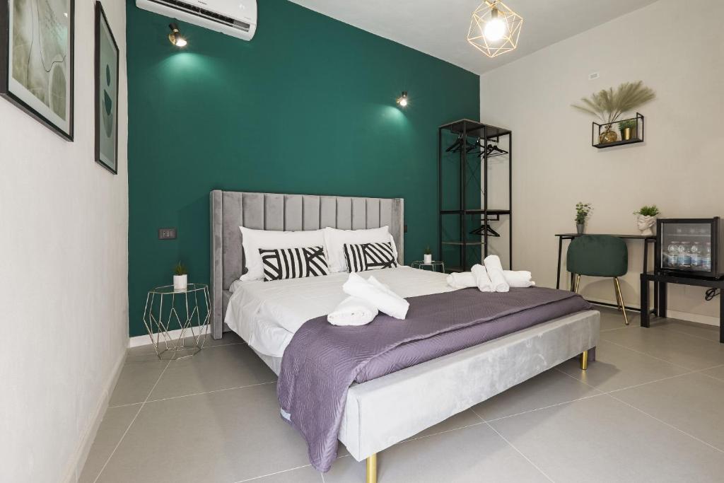 Postel nebo postele na pokoji v ubytování Chianu Palì - Guest Rooms camera Agrigento