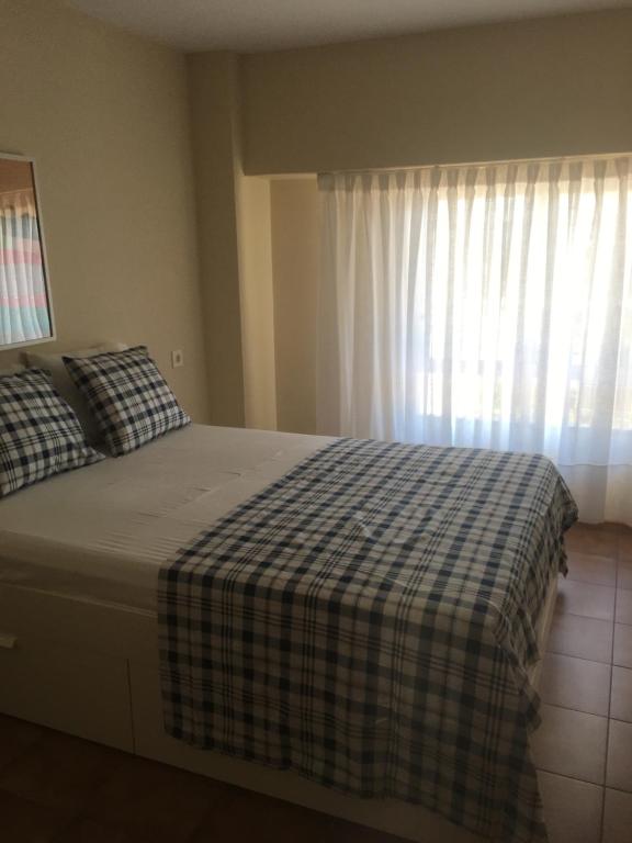 Postel nebo postele na pokoji v ubytování MAGNO CULLERA- Playa