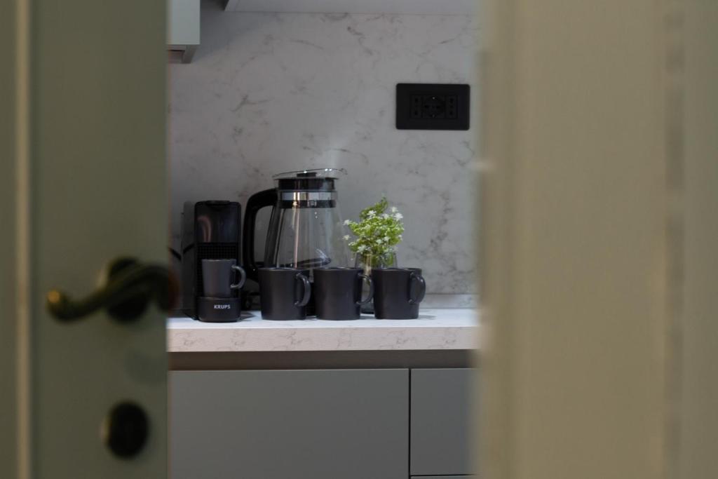 Kuchyňa alebo kuchynka v ubytovaní Salvia by PortofinoHomes