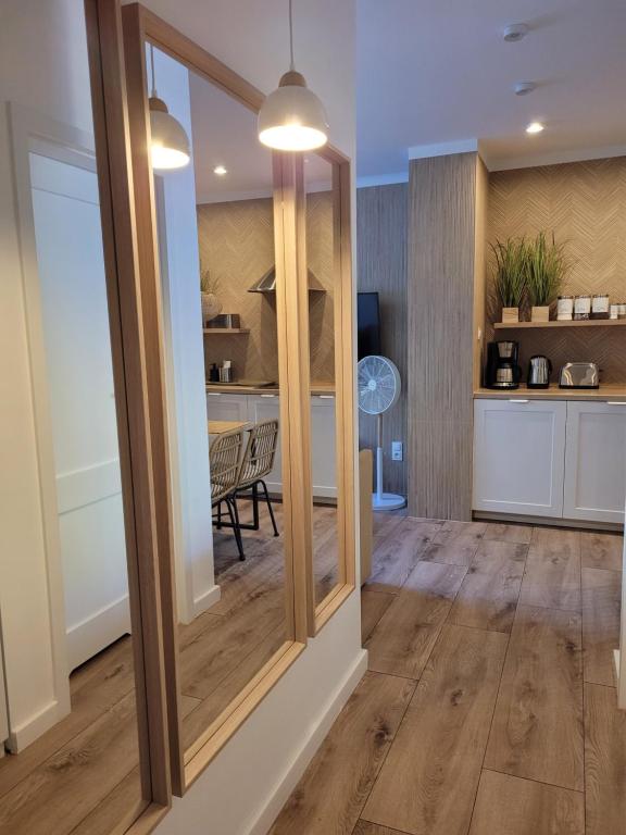 Kuchyň nebo kuchyňský kout v ubytování Apartamenty Forest&Sea