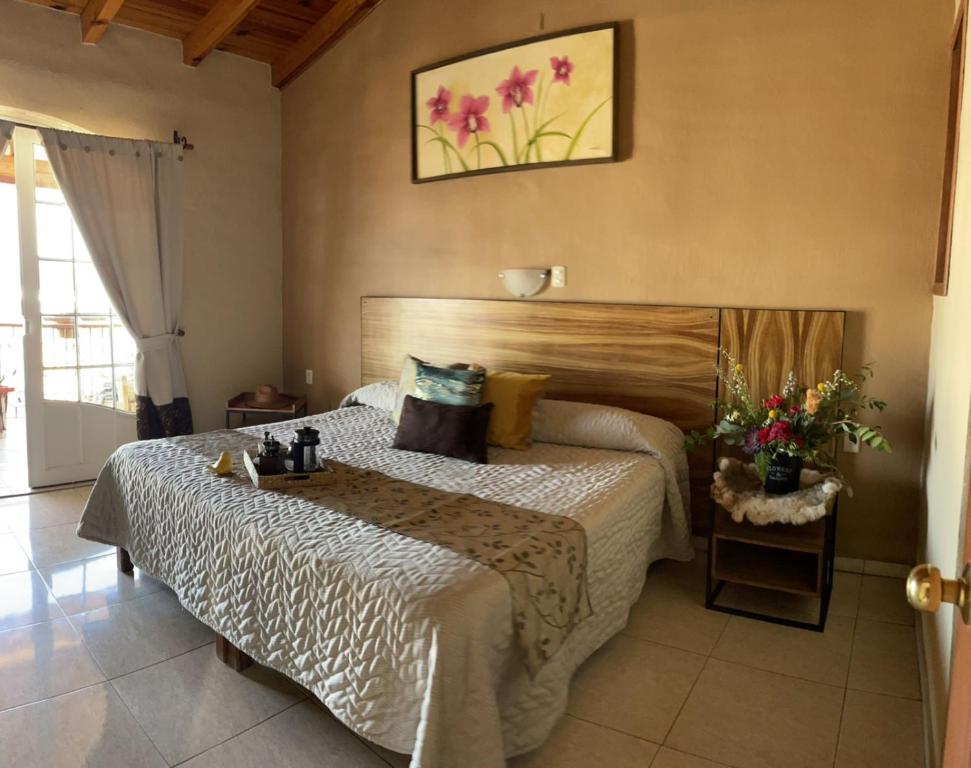 Postel nebo postele na pokoji v ubytování Hotel el Leñador