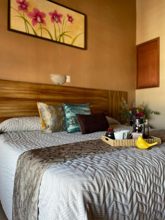 Postel nebo postele na pokoji v ubytování Hotel el Leñador