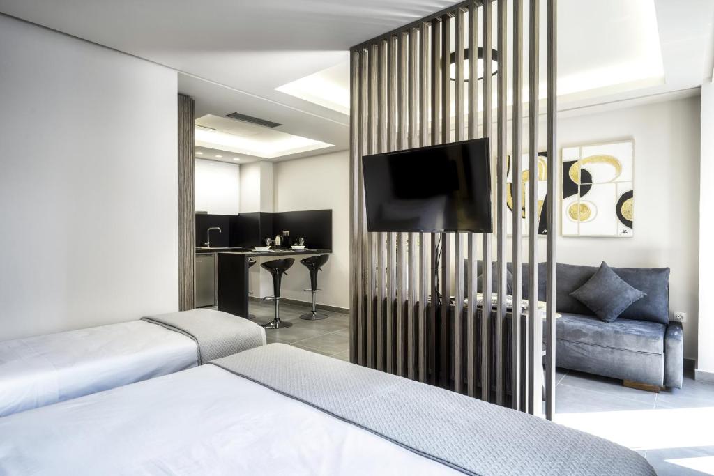 TV a/nebo společenská místnost v ubytování Evitel Luxury Living