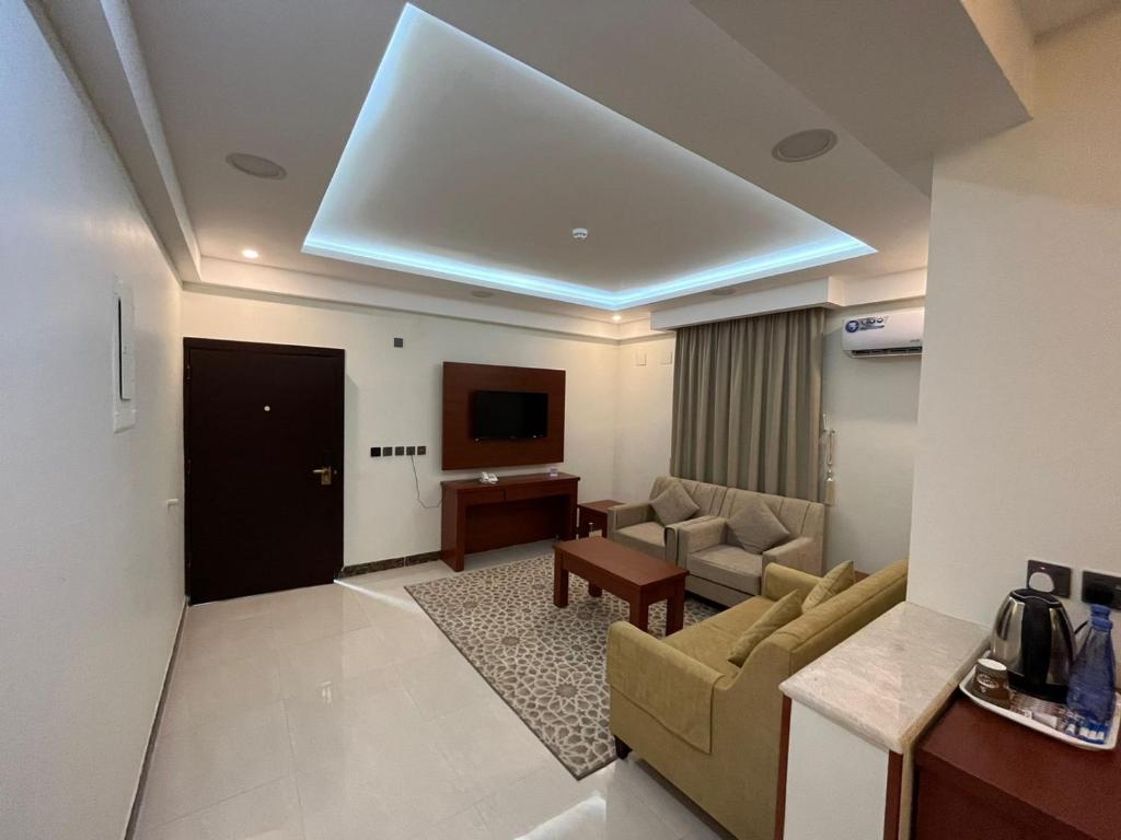 TV a/nebo společenská místnost v ubytování هاوس إن House Inn