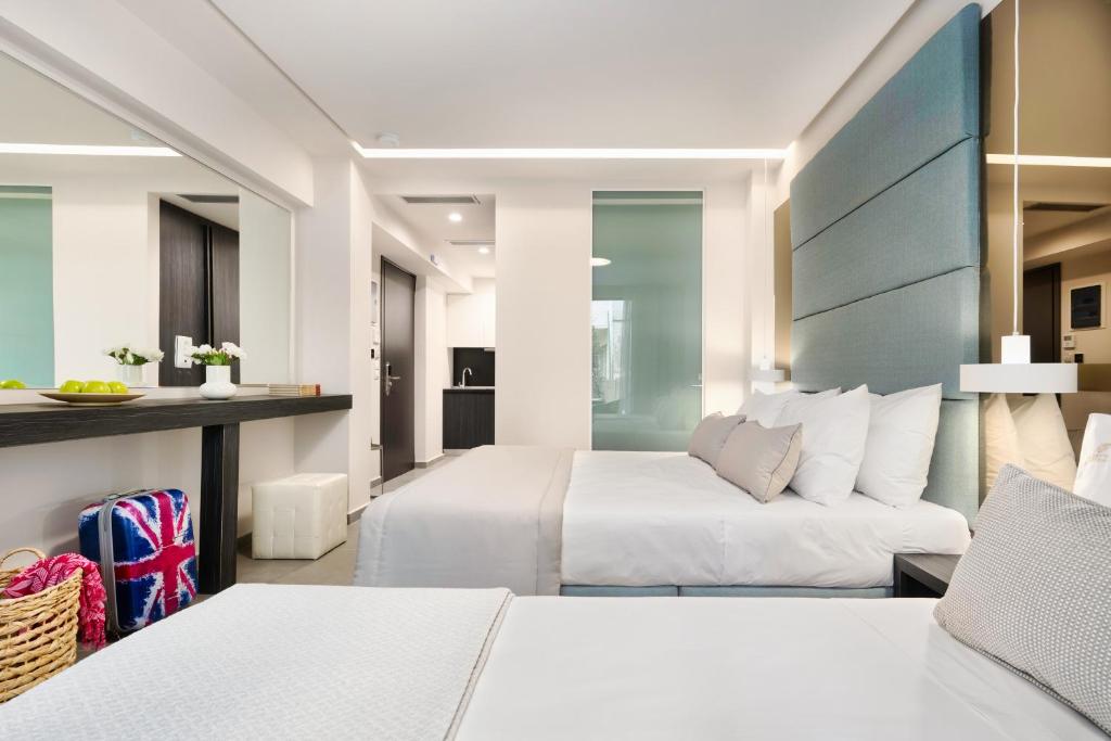 Postel nebo postele na pokoji v ubytování Evitel Luxury Living
