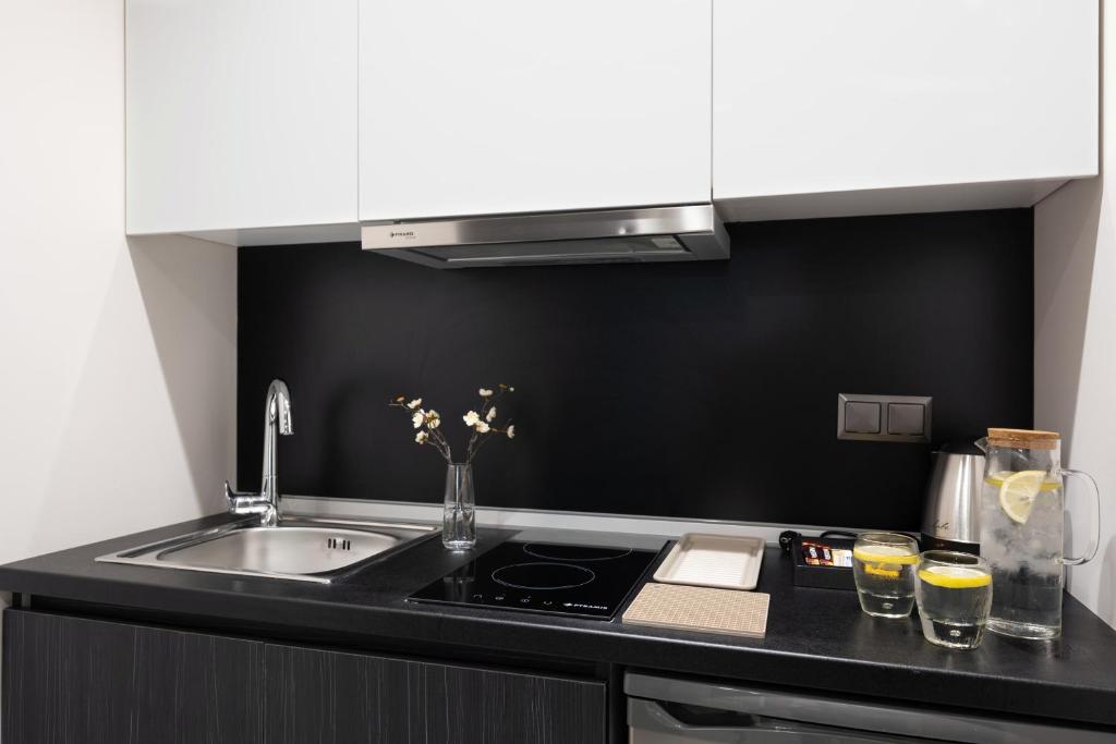 Kuchyň nebo kuchyňský kout v ubytování Evitel Luxury Living