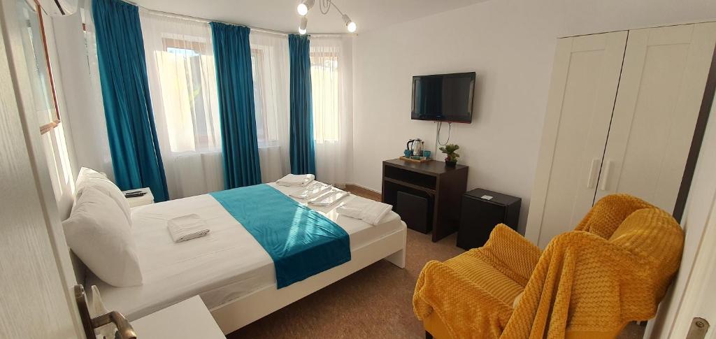 Postel nebo postele na pokoji v ubytování Turquoise Konak