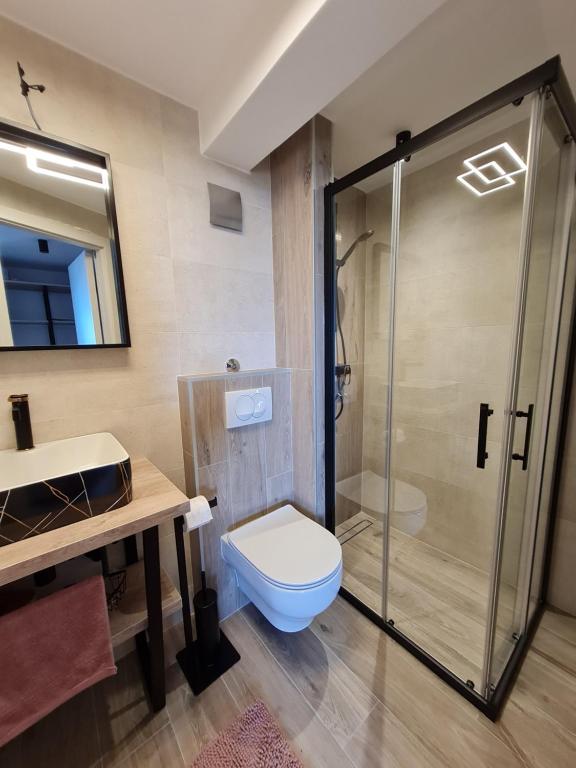 Kúpeľňa v ubytovaní Apartmani Donata