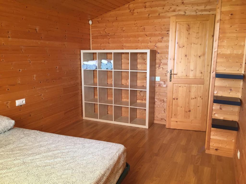 Posteľ alebo postele v izbe v ubytovaní Casa de Madera en Calafell