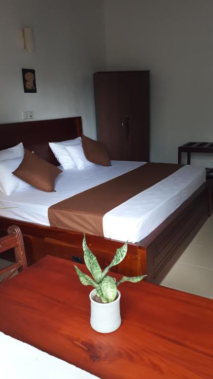 Postel nebo postele na pokoji v ubytování Jal,Min Homestay