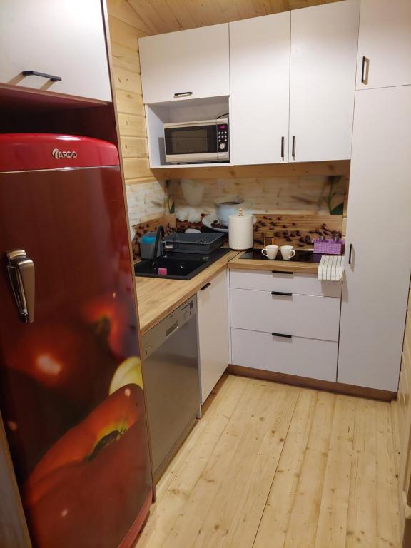 Kuchyňa alebo kuchynka v ubytovaní Domek Kalilla