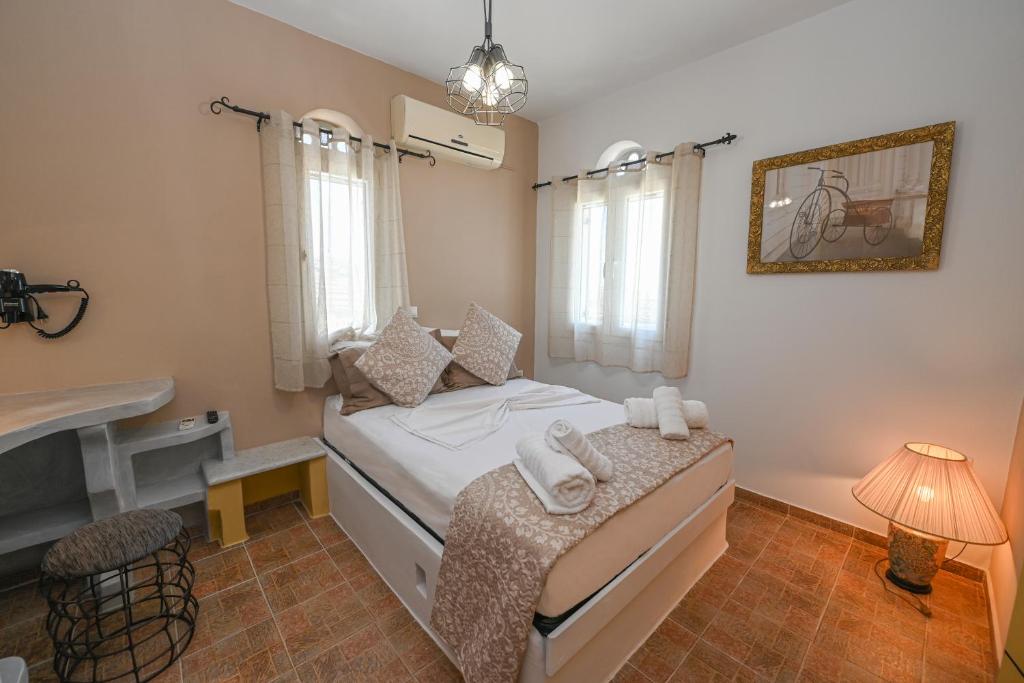 Postel nebo postele na pokoji v ubytování Aesthetic View Apartments