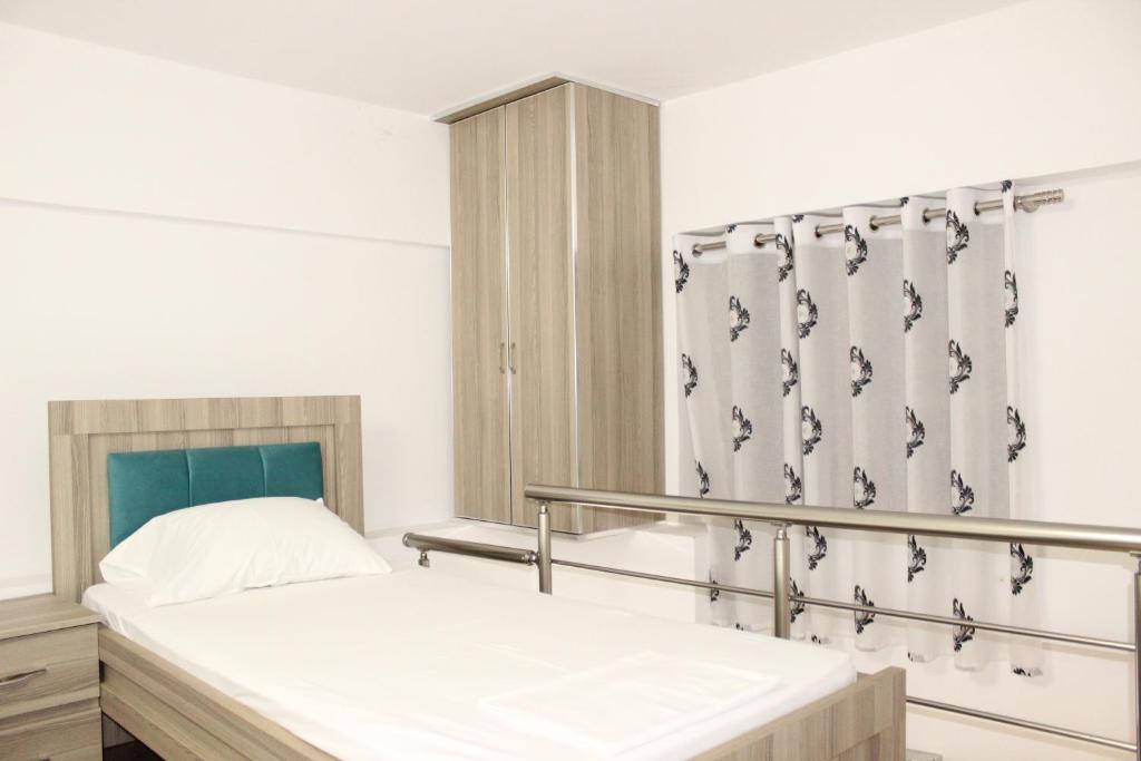 Postel nebo postele na pokoji v ubytování Bebi Hotel And Apartments