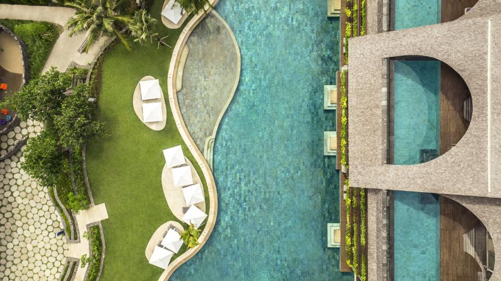 an overhead view of the pool at the resort at COMO Uma Canggu in Canggu
