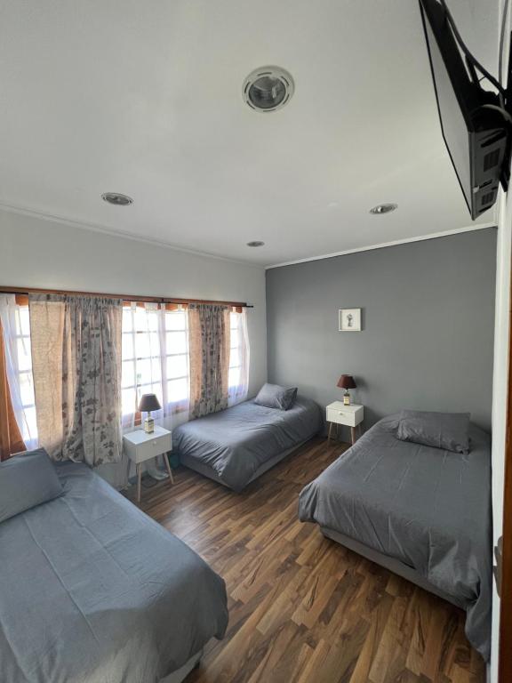 Postel nebo postele na pokoji v ubytování Hostal FloryMar