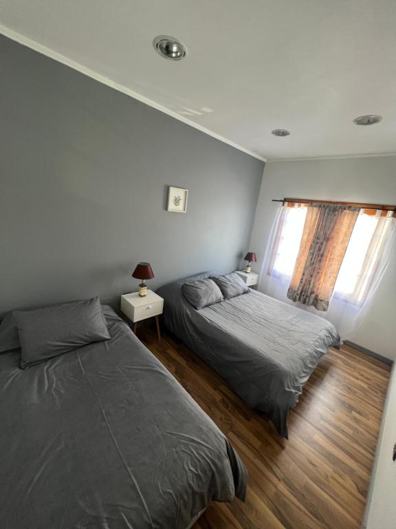 Postel nebo postele na pokoji v ubytování Hostal FloryMar