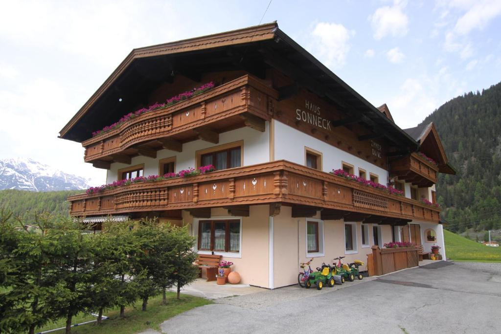a building with flowers on the top of it at Haus Sonneck in Niederthai