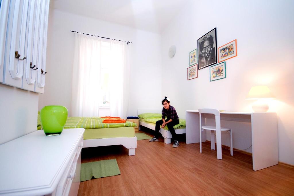 Postel nebo postele na pokoji v ubytování CentrÁlom Apartman