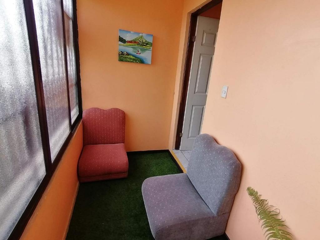 Posezení v ubytování Marta's Guesthouses, apartamentos con entrada autonoma